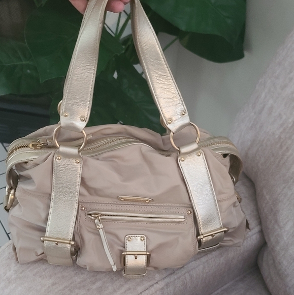 Michael Kors Handbags - Michael Kors Cream and Gold Shoulder Bag with Metallic Accents